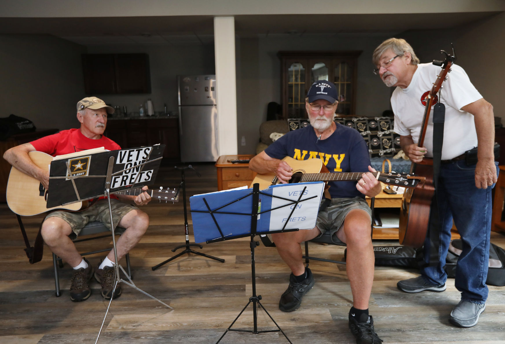 Vets on Frets work on song during reherasal